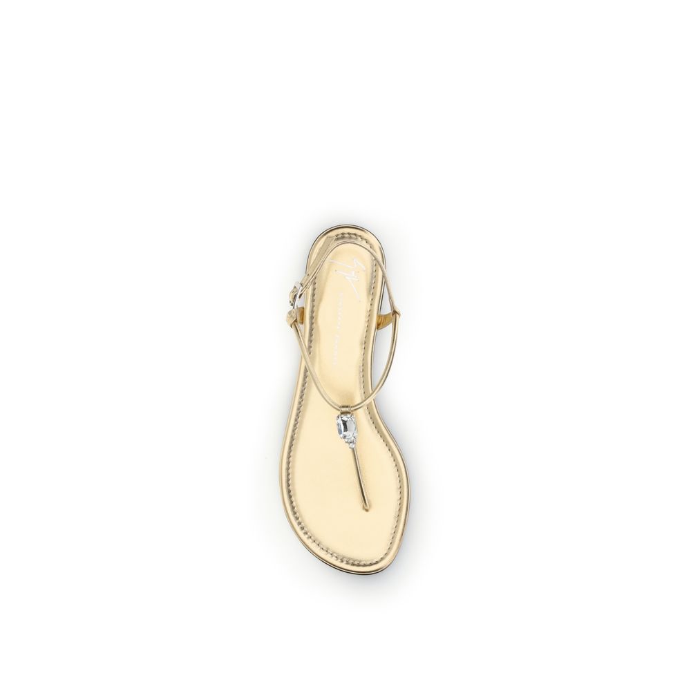 Sandales plates Giuseppe Zanotti en cuir de veau doré (Bos Taurus)