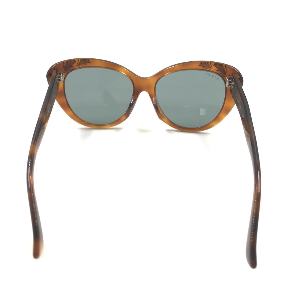 Lunettes de soleil œil-de-chat Gucci à écailles de tortue
