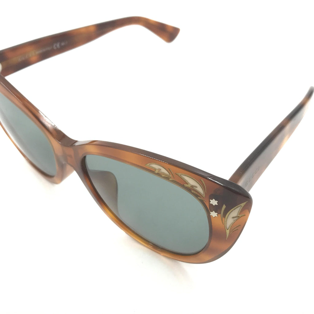 Lunettes de soleil œil-de-chat Gucci à écailles de tortue