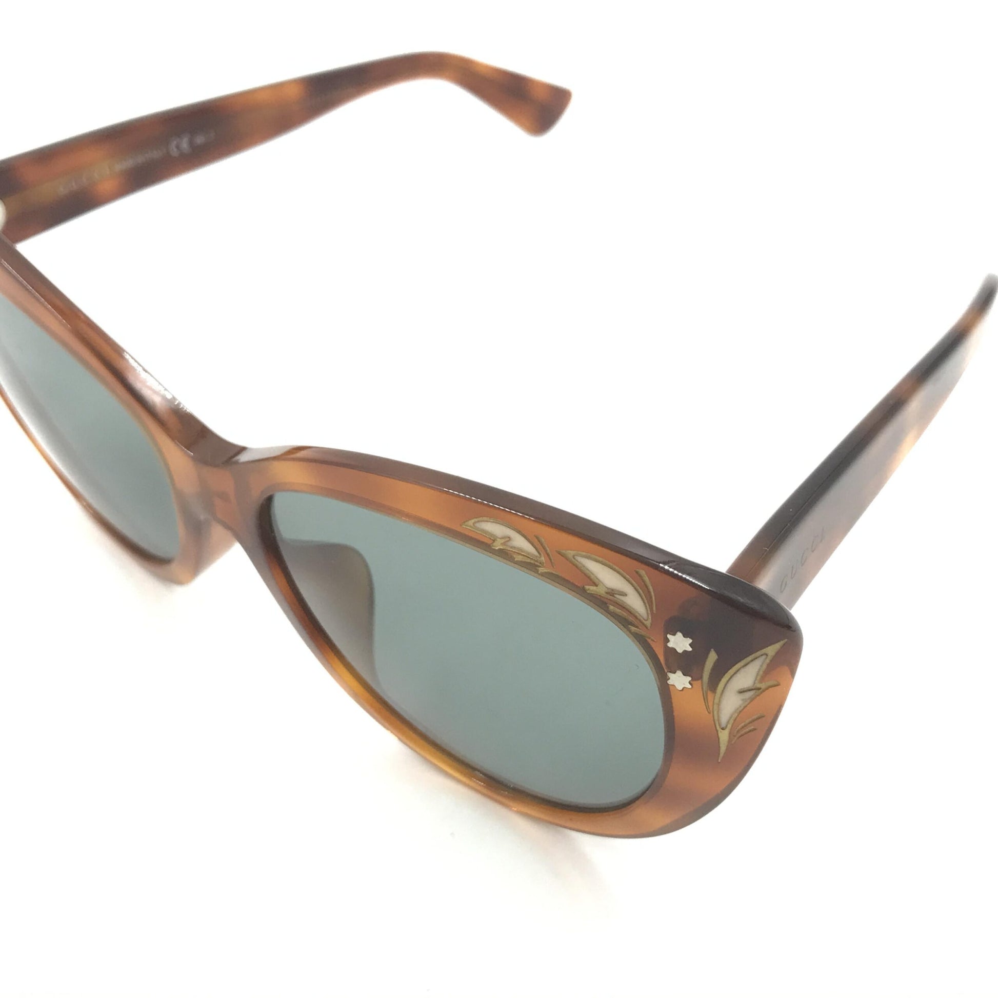 Lunettes de soleil œil-de-chat Gucci à écailles de tortue