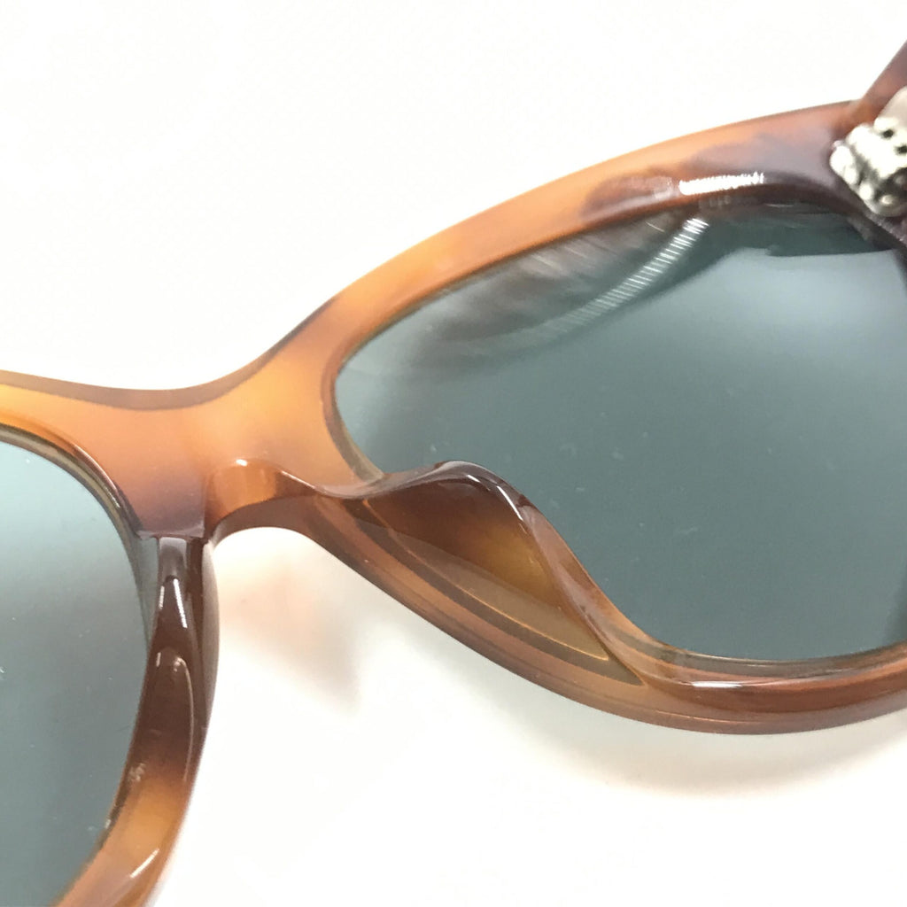 Lunettes de soleil œil-de-chat Gucci à écailles de tortue