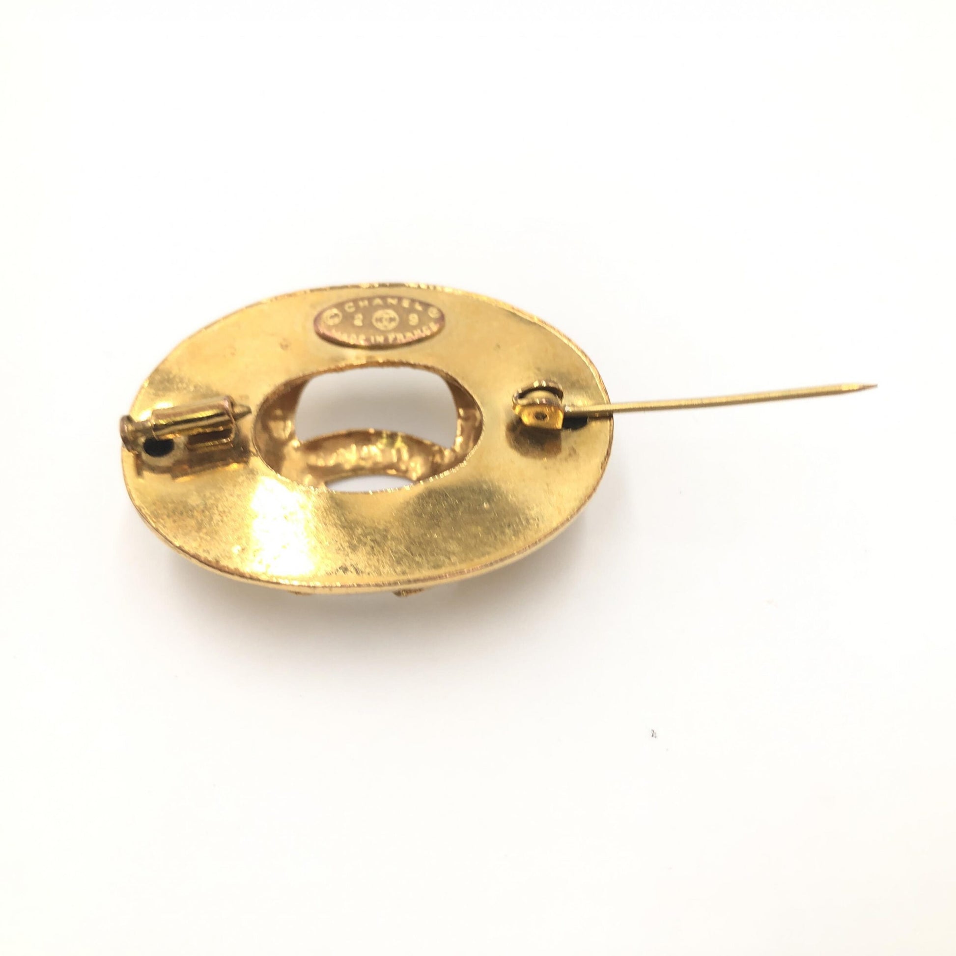Broche Chanel Coco Mark