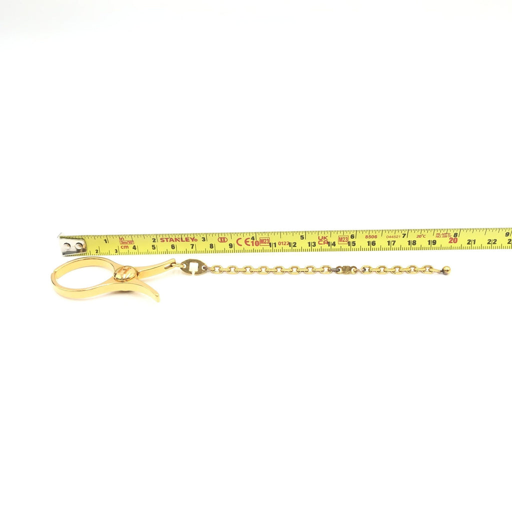 Hermès Gold Metal Glove Holder Keychain