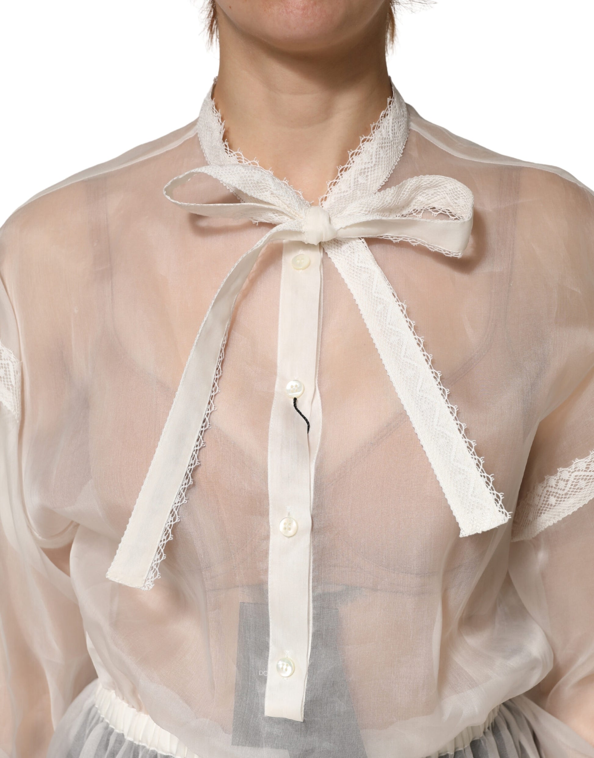 Chemisier en soie blanche transparente Dolce & Gabbana avec nœud en dentelle