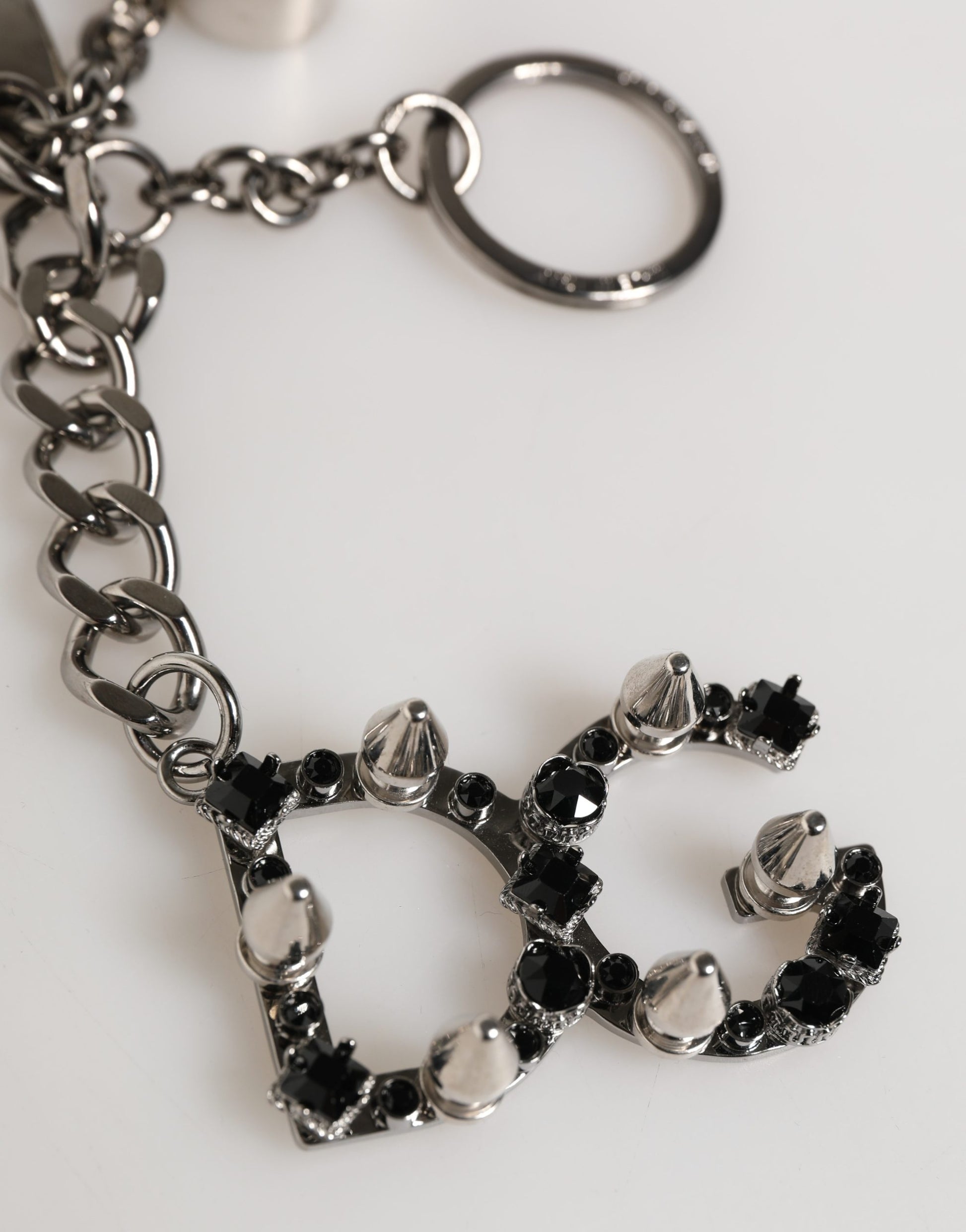 Porte-clés Dolce & Gabbana en métal argenté avec logo DG et strass