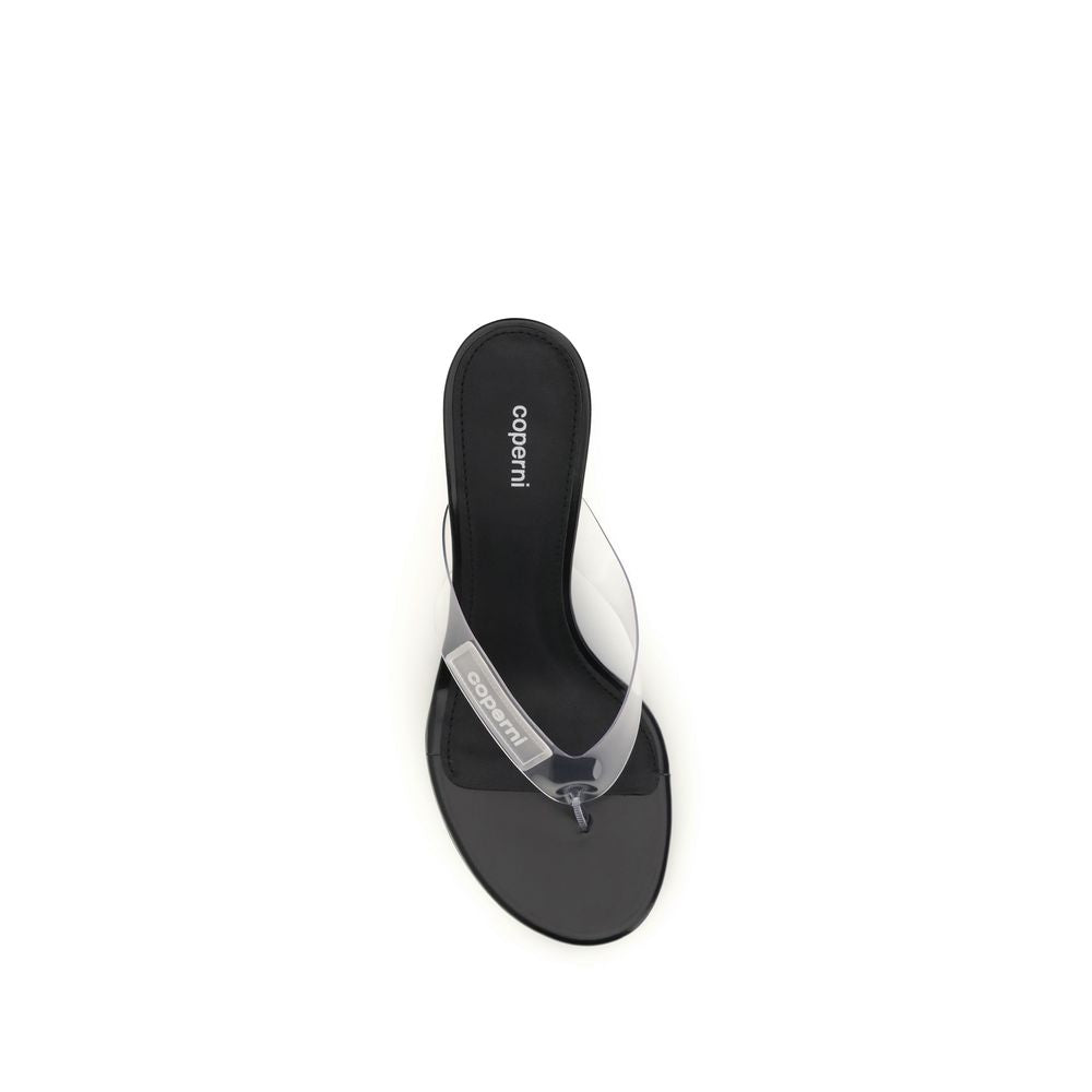Sandales claquettes Coperni en PVC noir