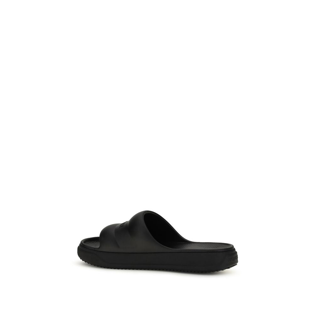 Sandales plates Moncler en caoutchouc noir