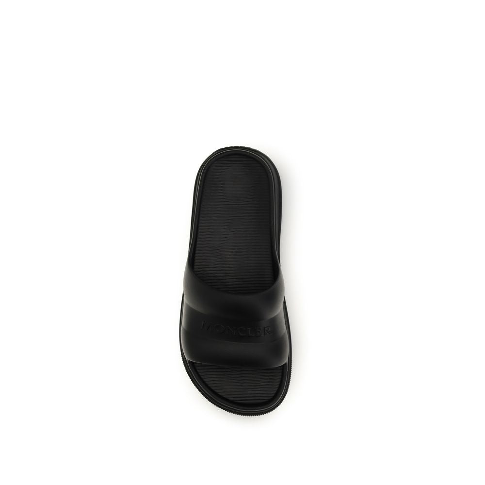 Sandales plates Moncler en caoutchouc noir