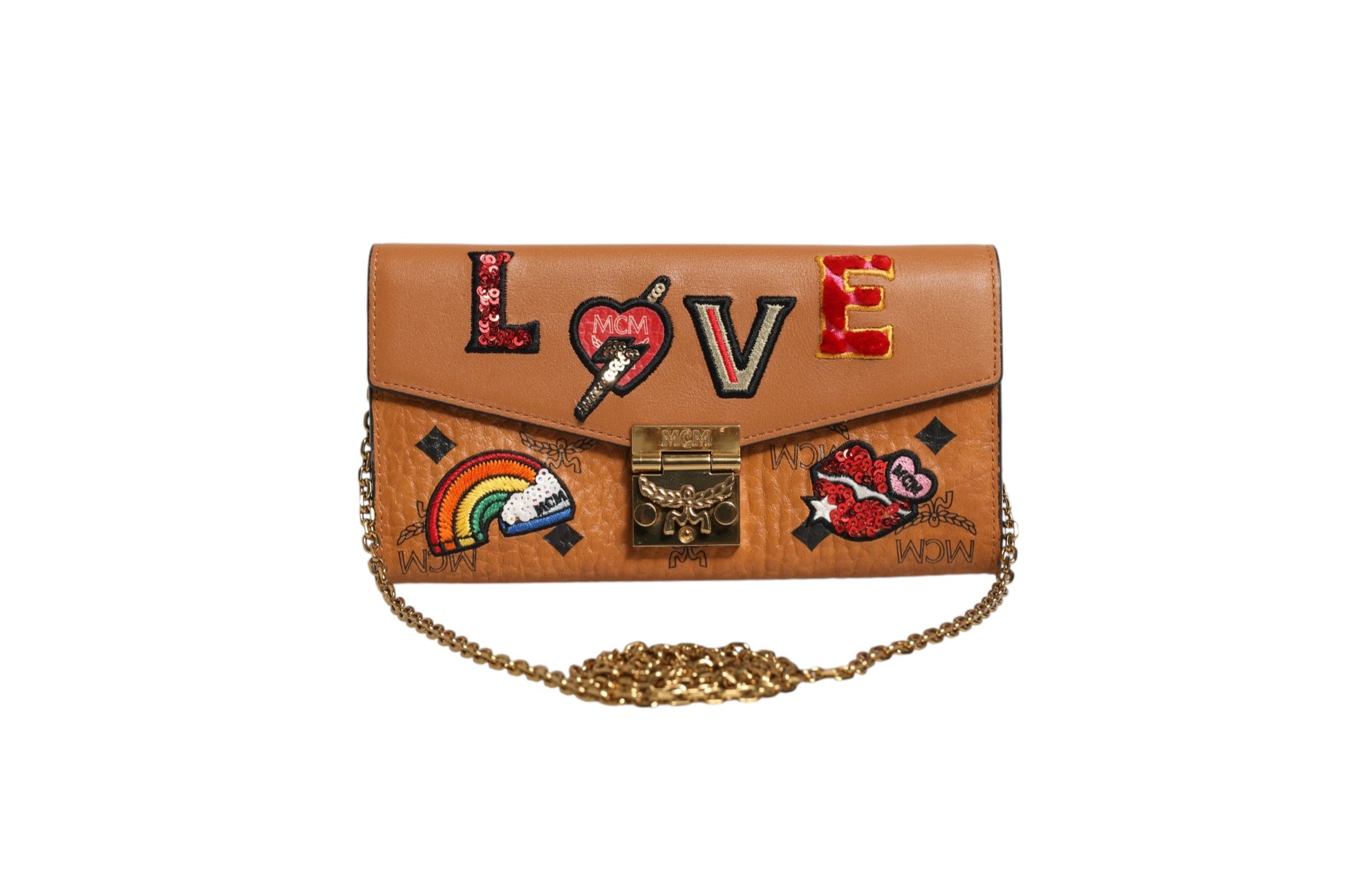 Portefeuille chaîne MCM en toile enduite marron cognac Visetos Patricia avec patch Love