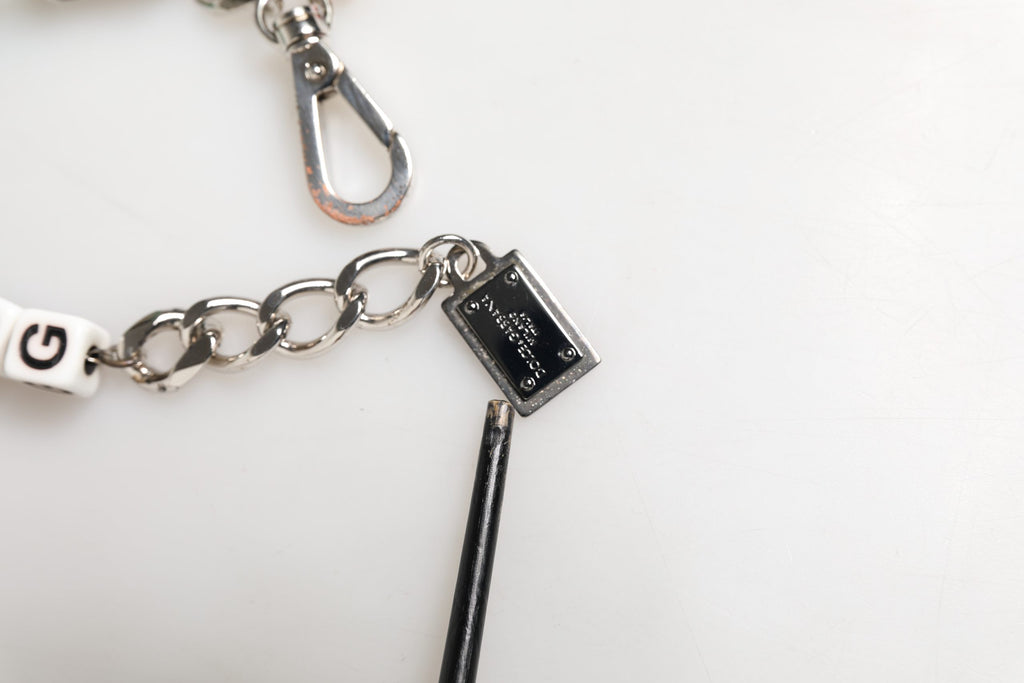 Bracelet à breloques Dolce & Gabbana en laiton argenté avec dés et logo DG