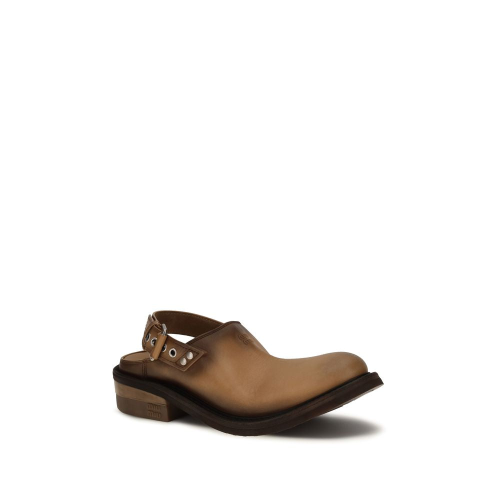 Mules Miu Miu en cuir de veau marron Bos Taurus