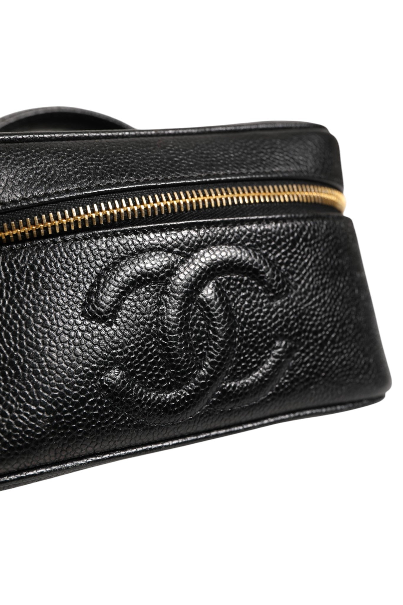 Trousse à maquillage Chanel noire et dorée