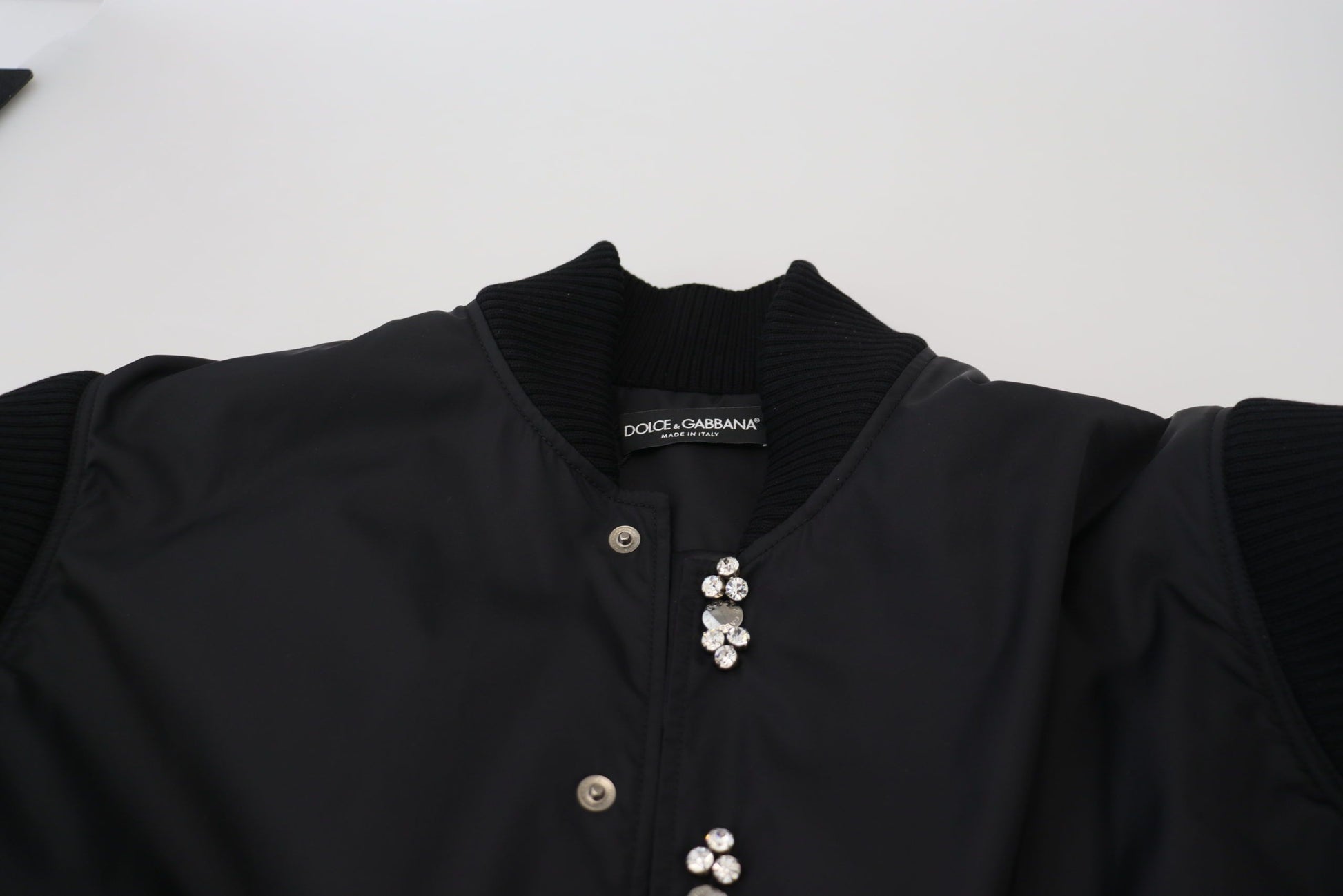 Veste Dolce & Gabbana en nylon noir avec boutons en cristal
