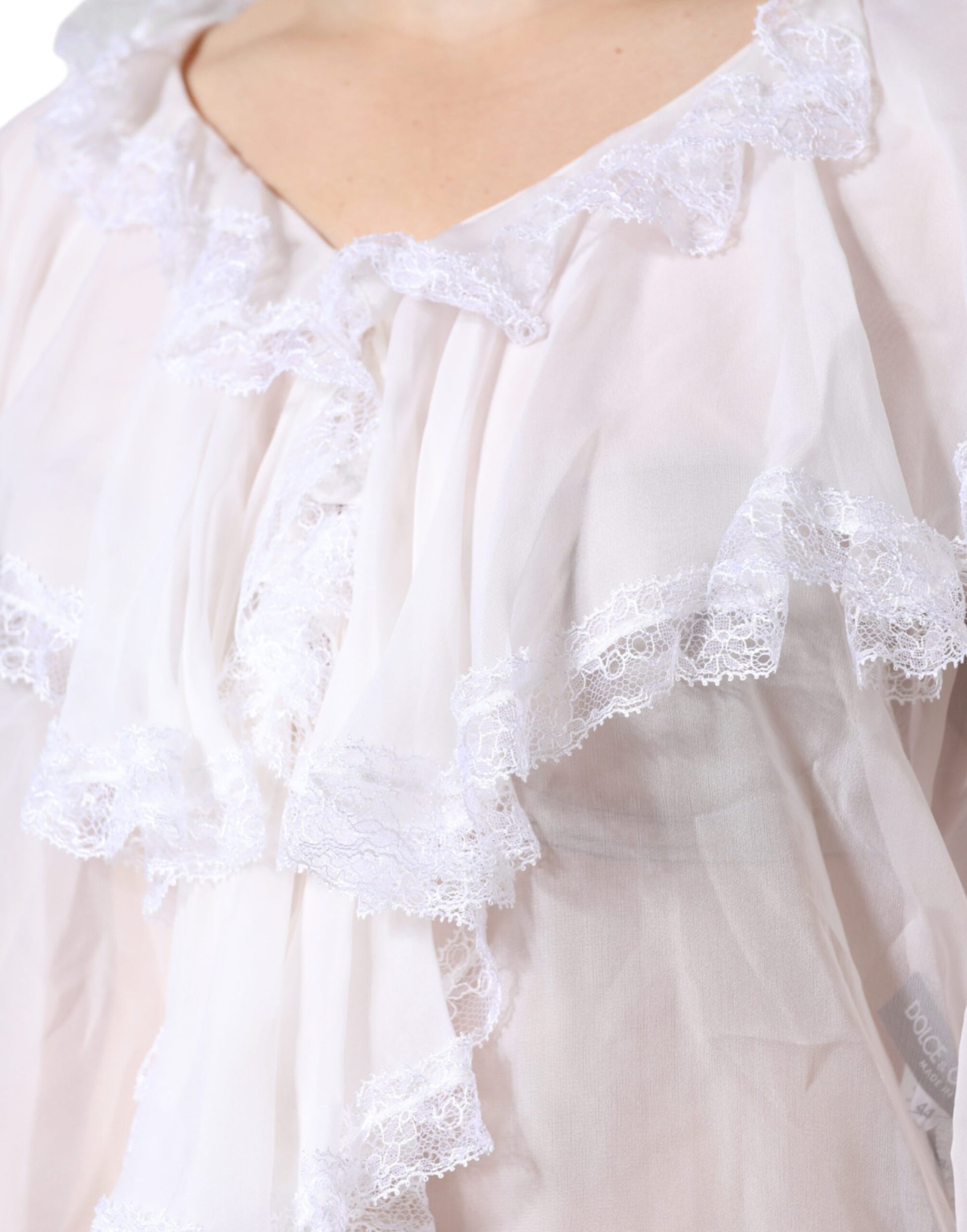 Chemisier blanc à manches longues en dentelle et volants Dolce & Gabbana