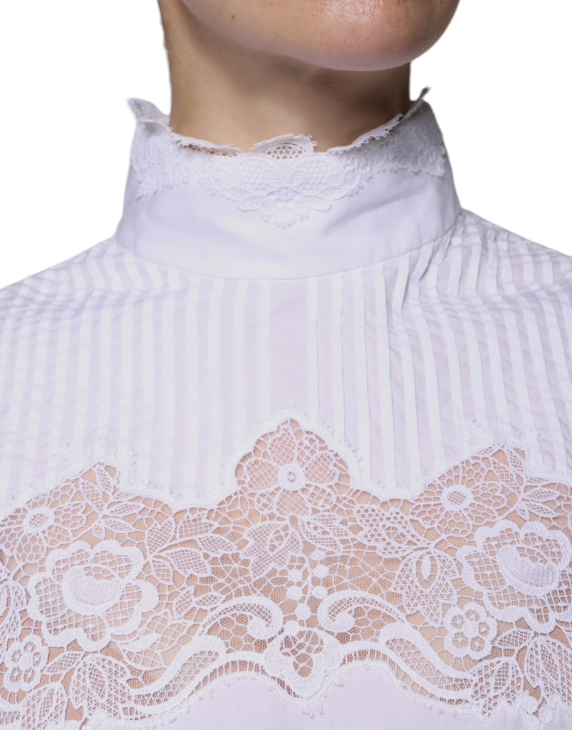 Chemisier col roulé Dolce & Gabbana en coton blanc avec dentelle