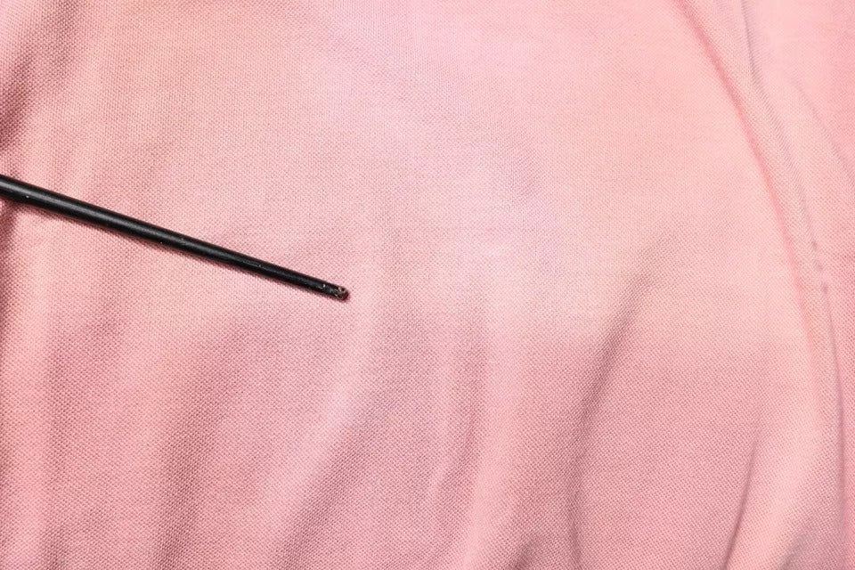 Polo à manches courtes Dolce & Gabbana rose avec col orné d'une couronne