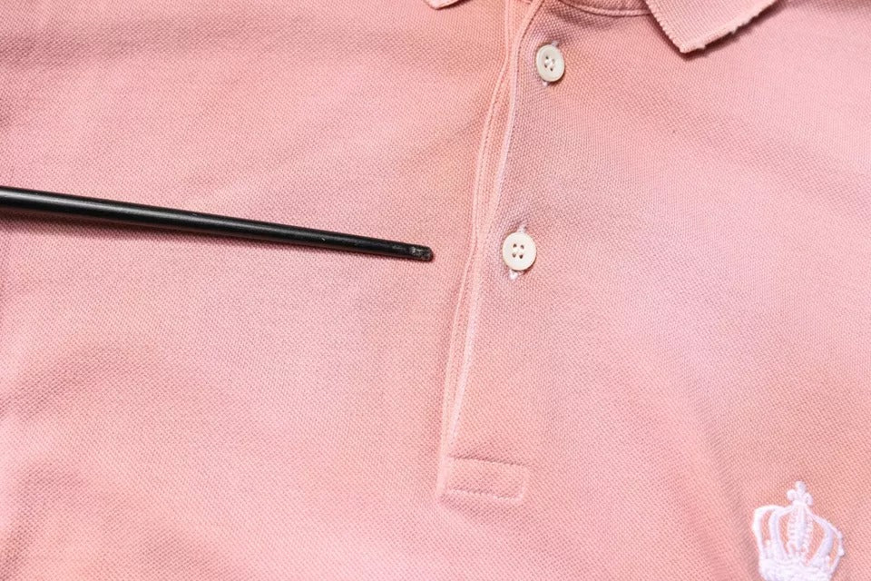 Polo à manches courtes Dolce & Gabbana rose avec col orné d'une couronne