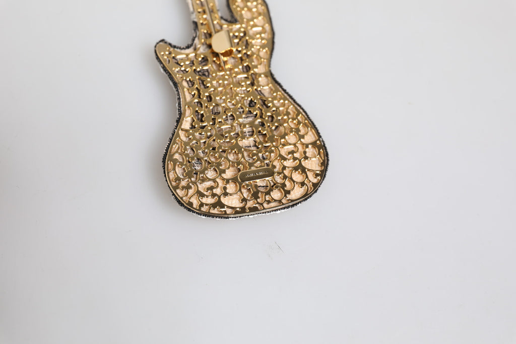 Broche en épingle à guitare Dolce & Gabbana en laiton doré avec perles et logo
