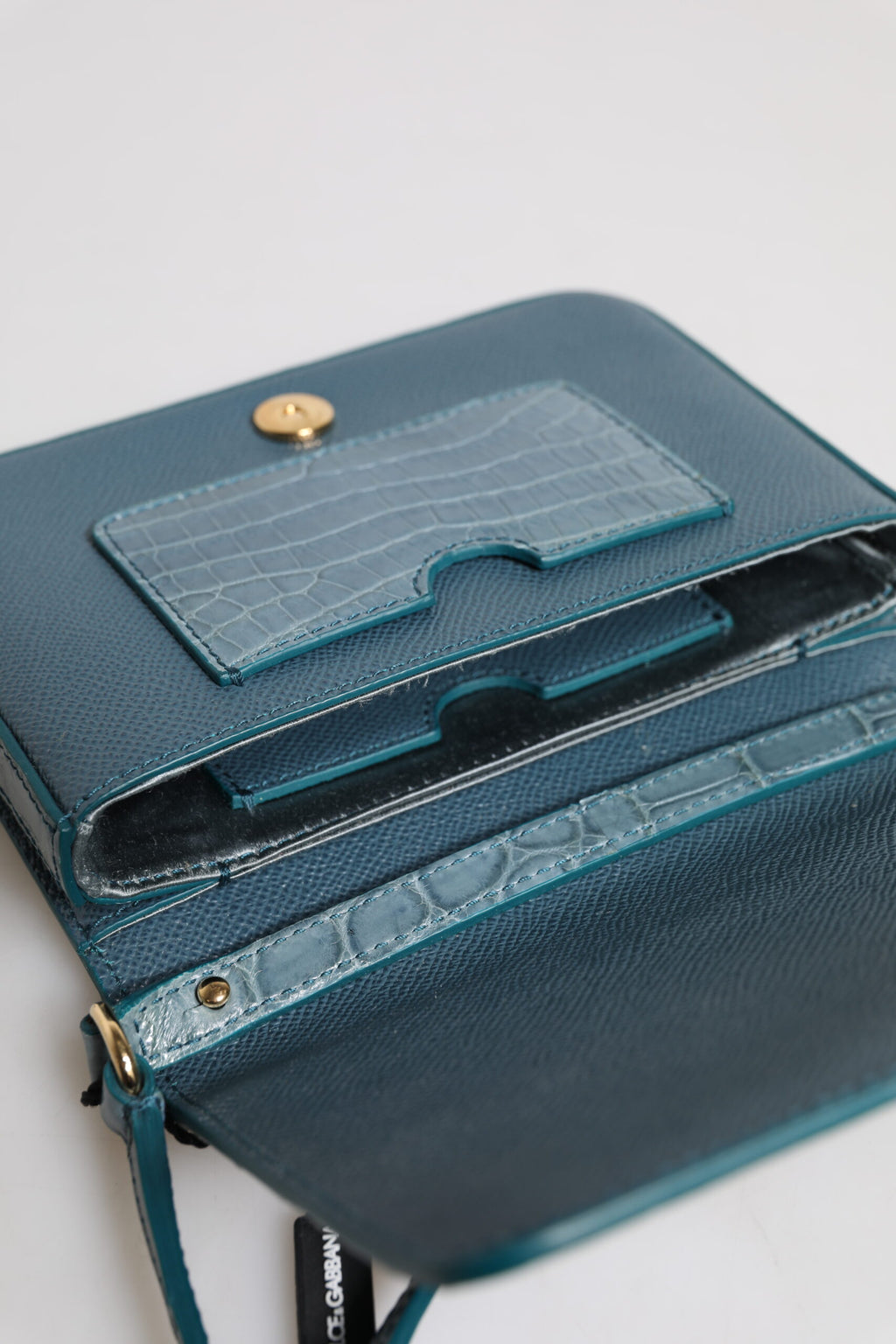 Dolce & Gabbana Grüne Crossbody-Minitasche aus exotischem Leder mit DG-Plakette