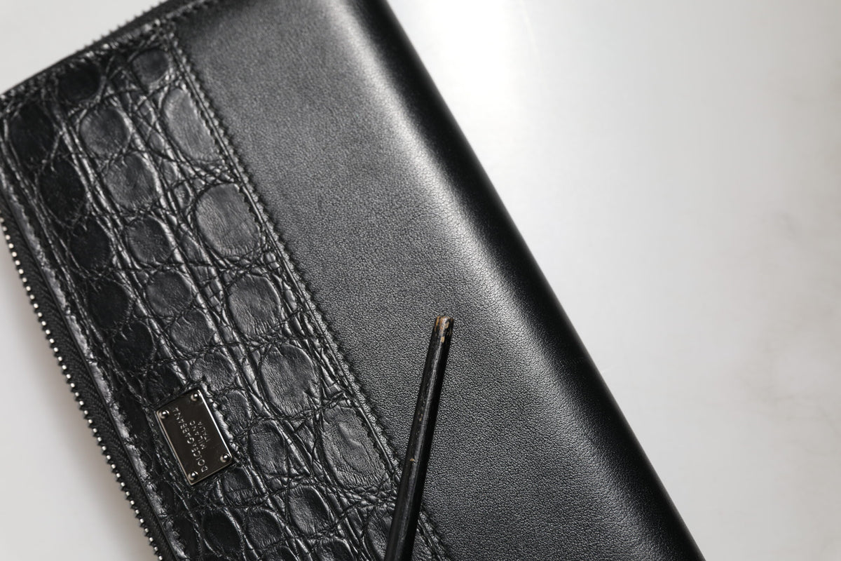 Portefeuille continental zippé Dolce & Gabbana en cuir noir avec plaque DG
