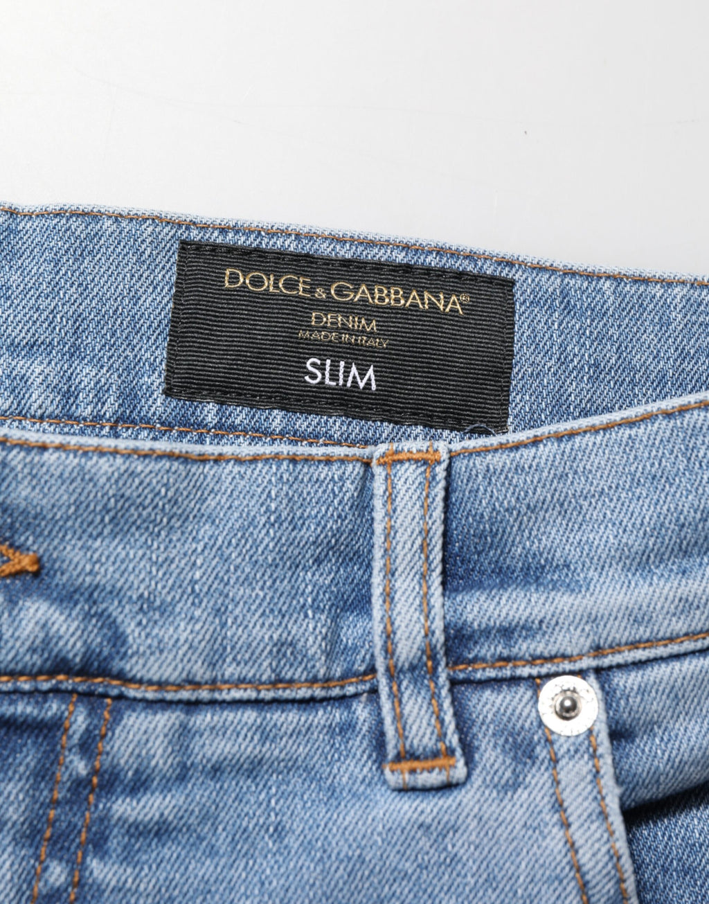 Jean en jean de coton coupe slim déchiré bleu Dolce & Gabbana