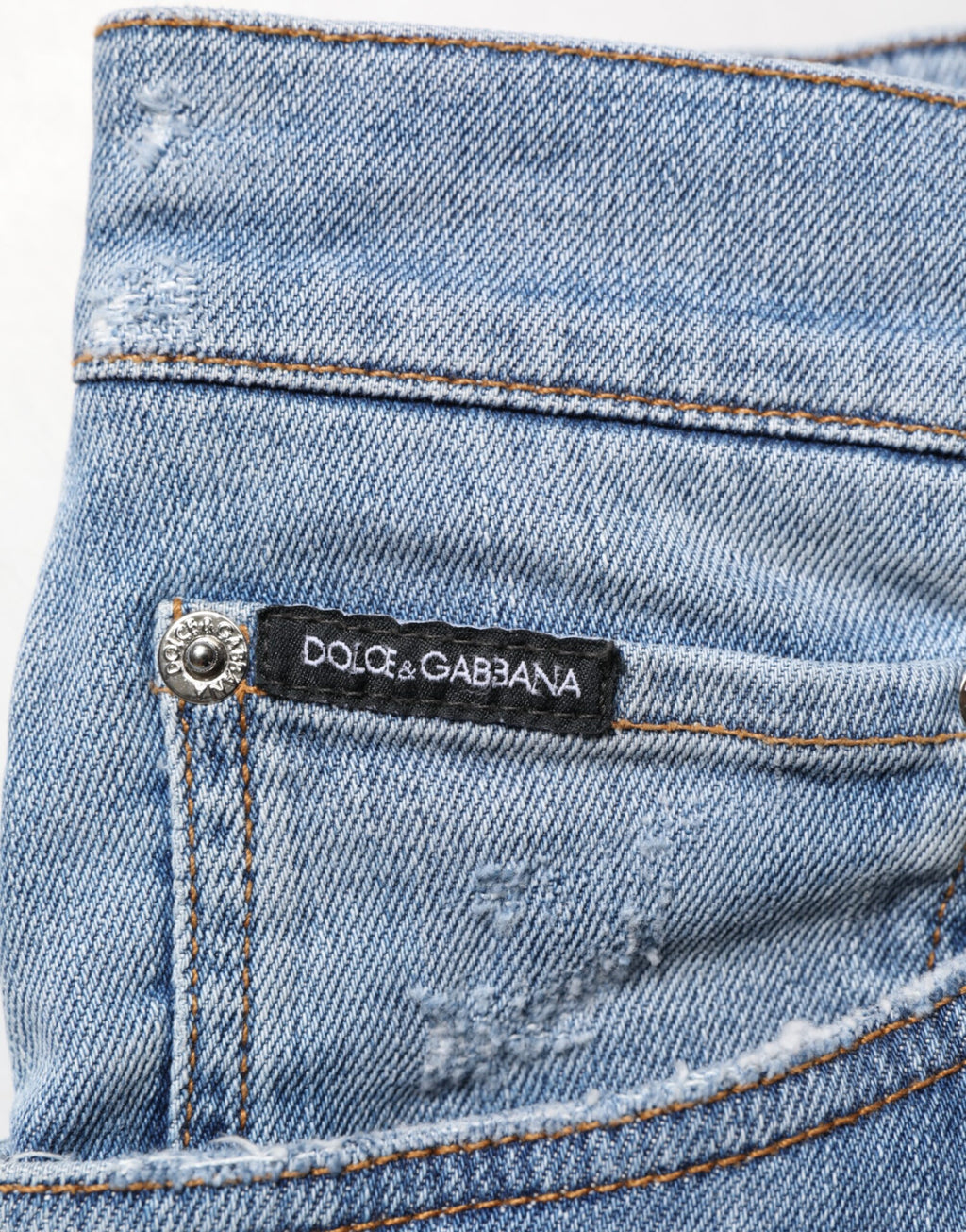 Jean en jean de coton coupe slim déchiré bleu Dolce & Gabbana