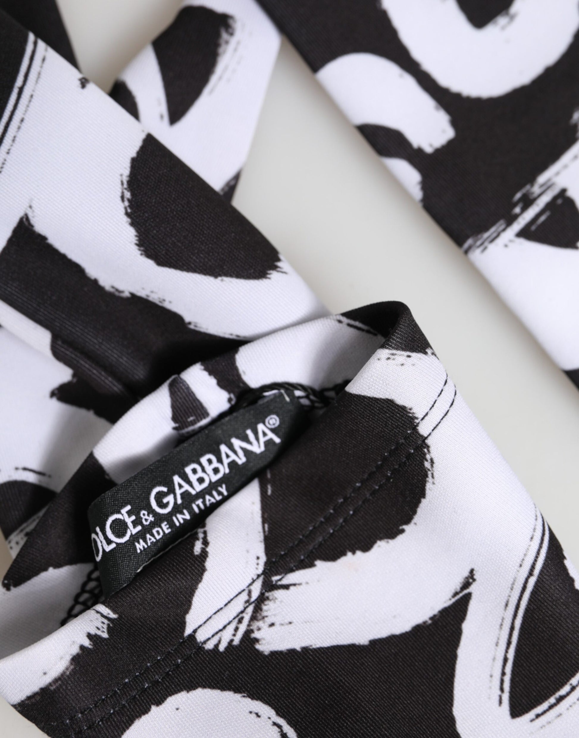 Gants mitaines Dolce & Gabbana noirs et blancs avec logo DG, longueur coude