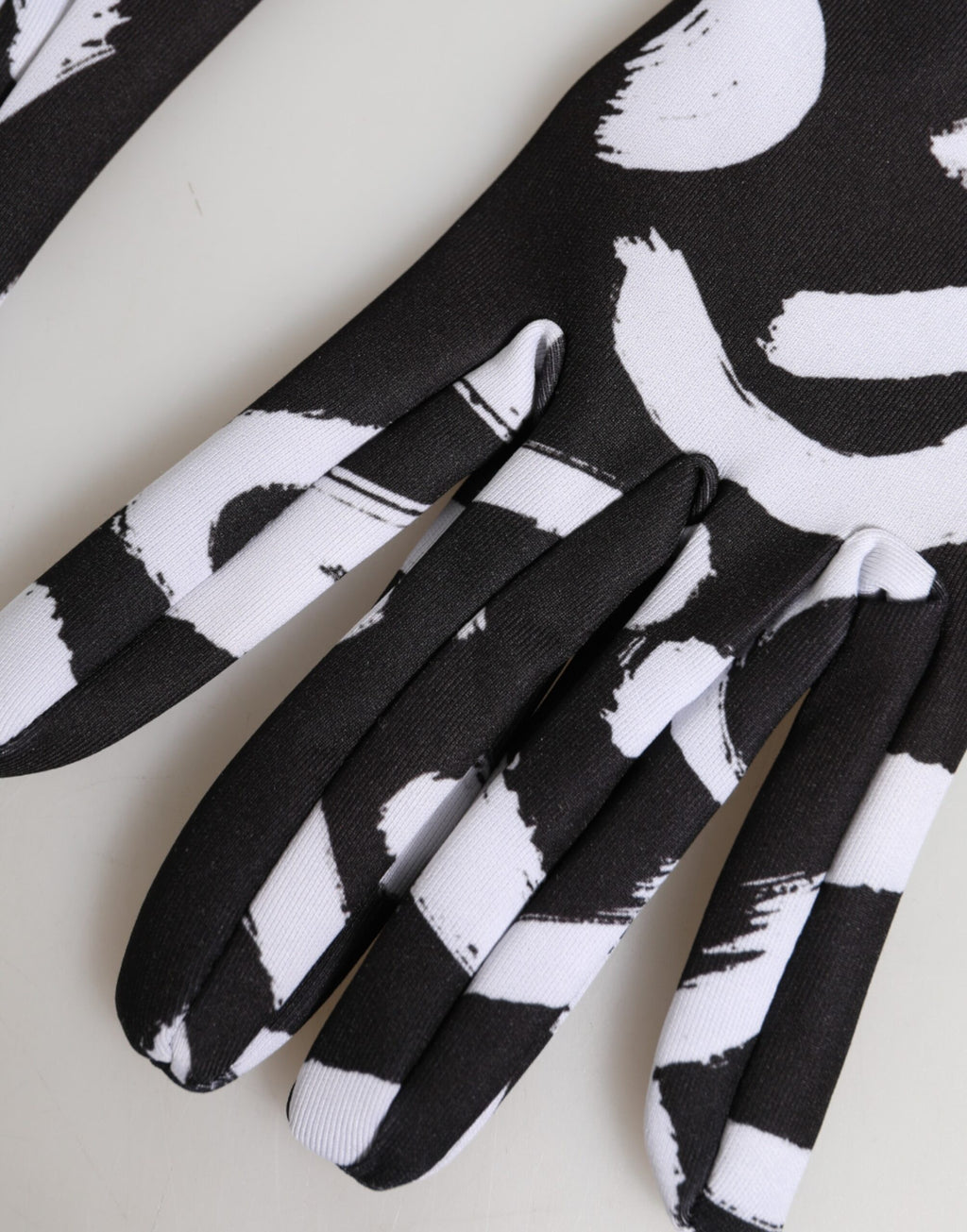 Gants mitaines Dolce & Gabbana noirs et blancs avec logo DG, longueur coude